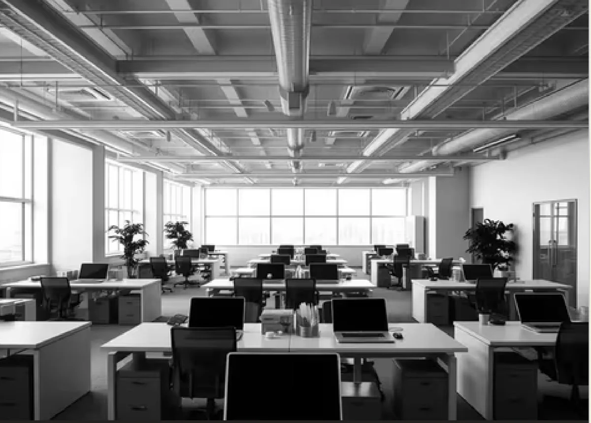 An empty Numata hub floor, desks ready for the day